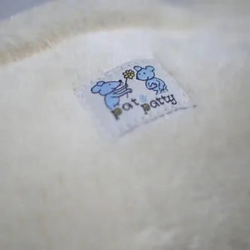 Bio Kuschelkissen EisbÀr waschbar- PAT & PATTY